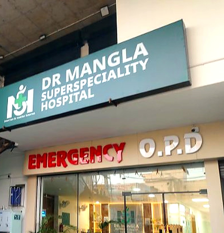 Dr. Mangla Superspeciality Hospital, front entrance with Emergency and OPD signage, Kurukshetra